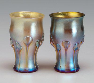 Appraisal: Pair Tiffany tumblers iridescent gold and blue with applied lily