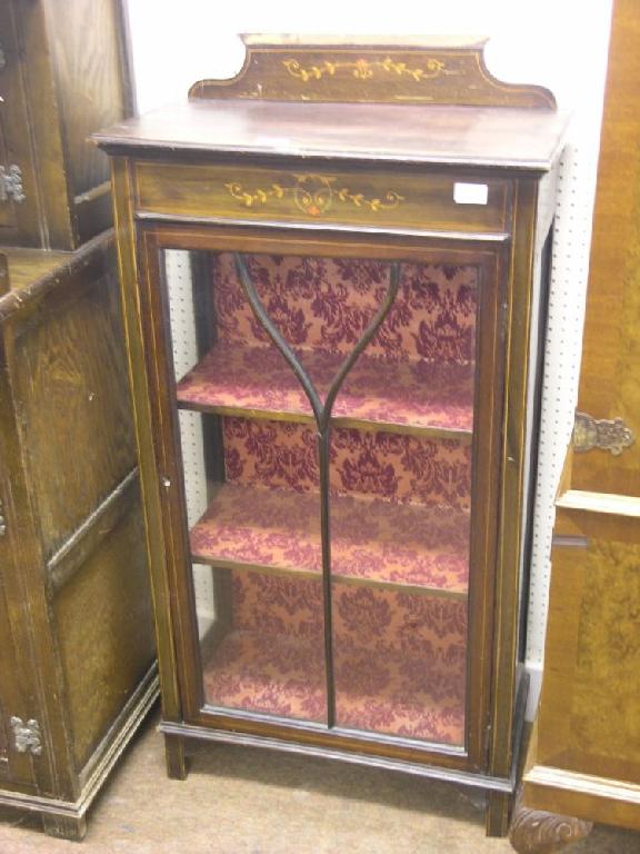 Appraisal: A late Victorian dark stained display cabinet frieze with painted