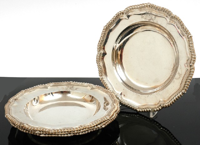 Appraisal: A SET OF FOUR GEORGE III STERLING SILVER SOUP PLATES