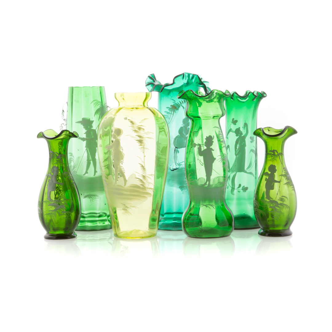 Appraisal: Seven Mary Gregory green glass vases to in H Condition