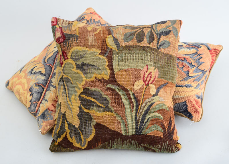 Appraisal: GROUP OF THREE VERDURE TAPESTRY PILLOWS AND TWO NEEDLEWORK PILLOWS