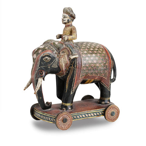 Appraisal: A th century Indian polychrome decorated elephant With mahout on