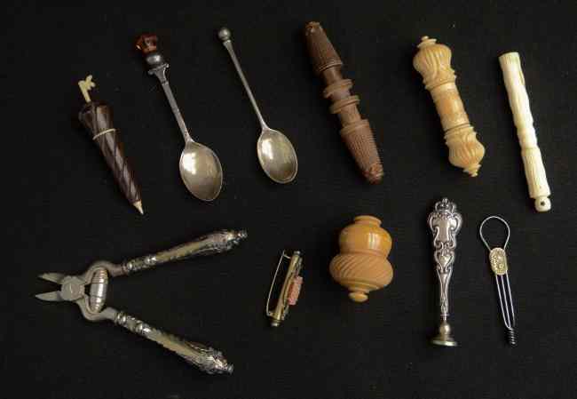 Appraisal: Assorted lot of silver spoons needle holders clipper seal and