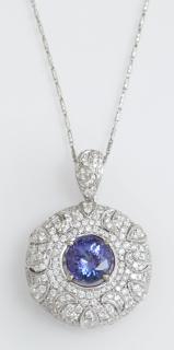 Appraisal: K White Gold Circular Pendant with a round carat tanzanite