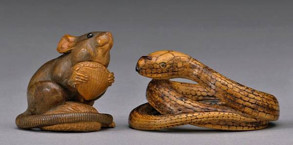 Appraisal: Two wood studies th Century The first a coiled snake