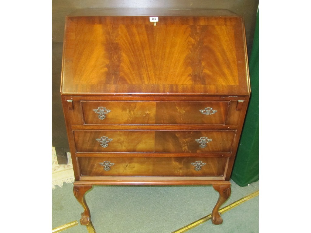 Appraisal: Mahogany writing bureau raised on ball and claw supports and