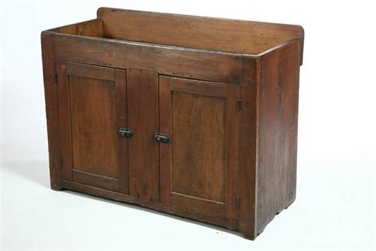 Appraisal: DRY SINK Walnut with two paneled doors and an interior