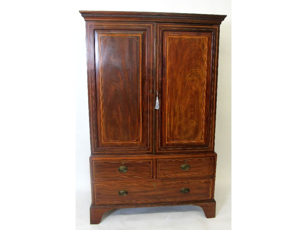 Appraisal: A th Century Sheraton style linen press with two panelled