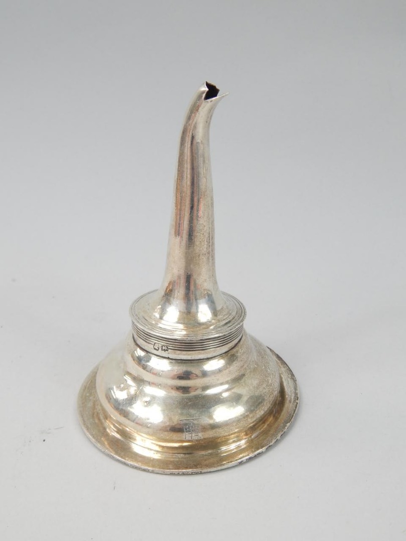 Appraisal: A George III silver wine funnel of typical outline London