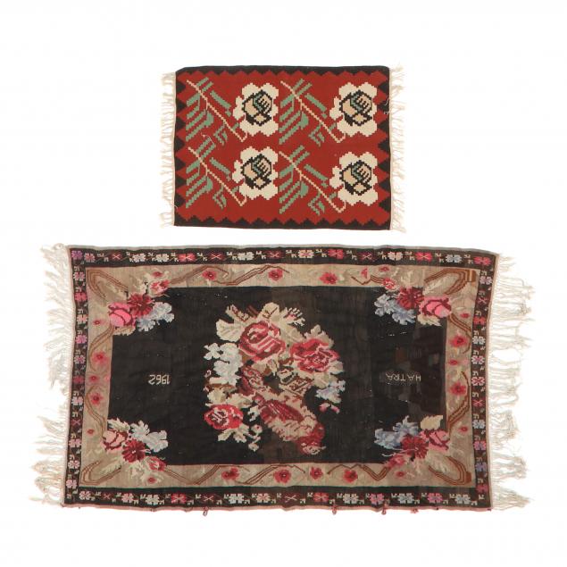 Appraisal: TWO TURKISH FLORAL KILIMS The first with brownish black field