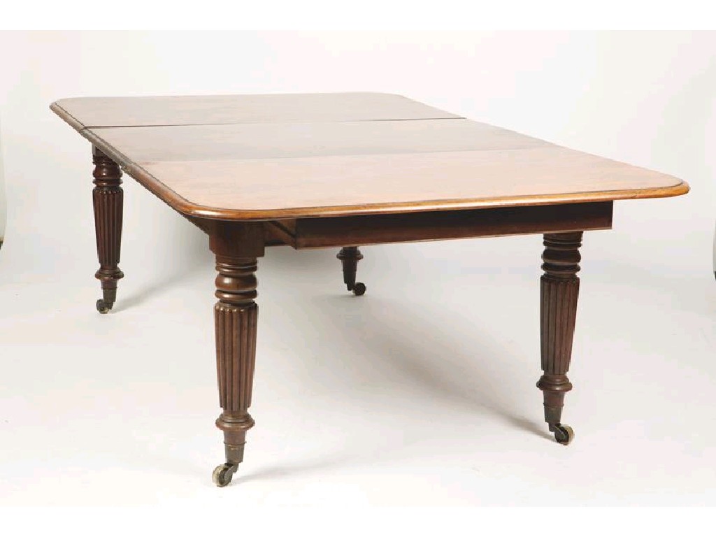 Appraisal: A LATE REGENCY MAHOGANY EXTENDING DINING TABLE the rectangular extending