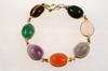 Appraisal: BRACELET - K yellow gold set with seven oval semi-precious