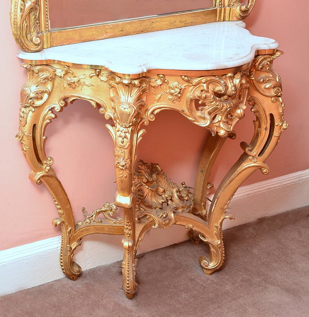 Appraisal: A TH CENTURY ITALIAN CARVED GILTWOOD CONSOLE TABLE with carved