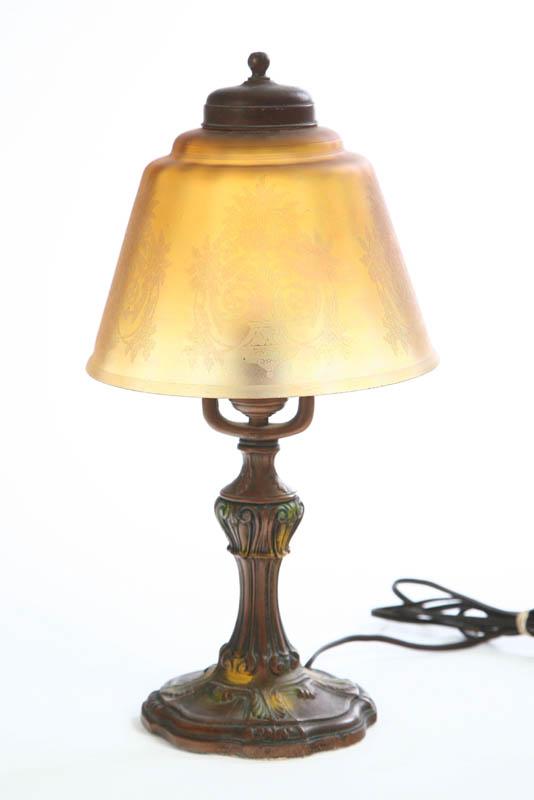 Appraisal: DRESSER LAMP Metal scalloped base and fluted baluster with an