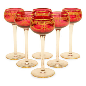 Appraisal: A Set of Twelve Bohemian Gilt Decorated Cranberry Glass Stemmed