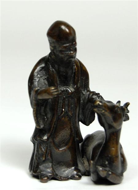 Appraisal: A th th century Chinese bronze figure of Shou Lao