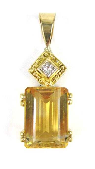 Appraisal: CITRINE DIAMOND AND FOURTEEN KARAT GOLD PENDANT with a princess-cut