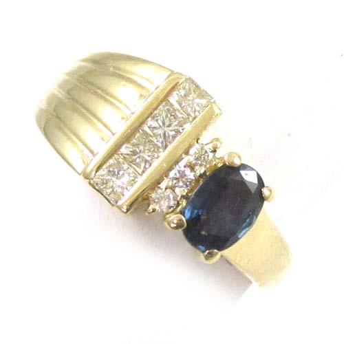 Appraisal: SAPPHIRE DIAMOND AND FOURTEEN KARAT GOLD RING set with four