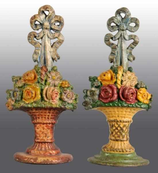 Appraisal: Lot of Cast Iron Doorstops Description Includes mixed flowers in