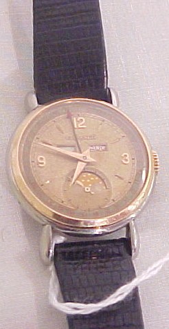 Appraisal: Man's LeCoultre trip date moon phase jewel wrist watch pink