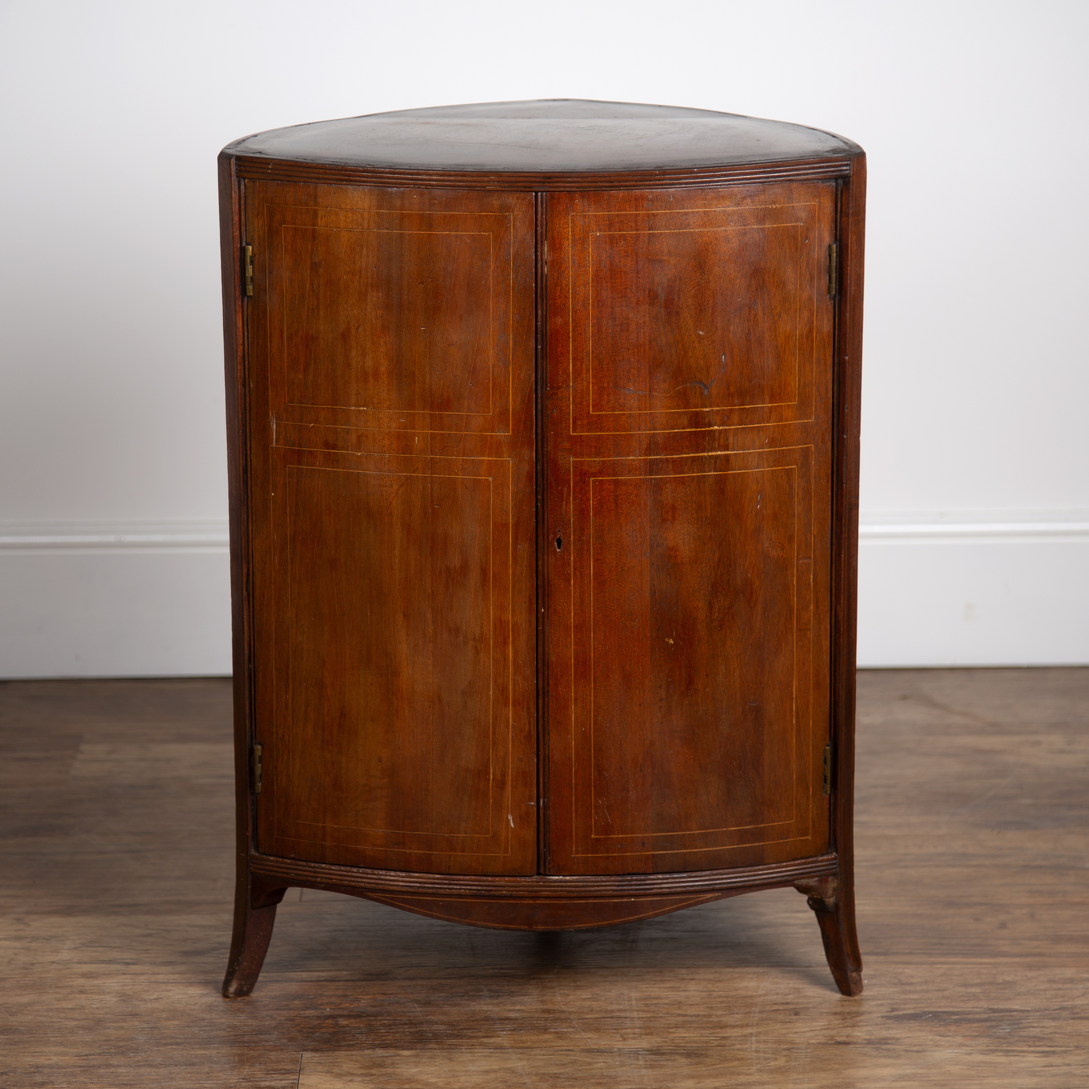 Appraisal: Mahogany and inlaid triangular cupboard th Century with two panel