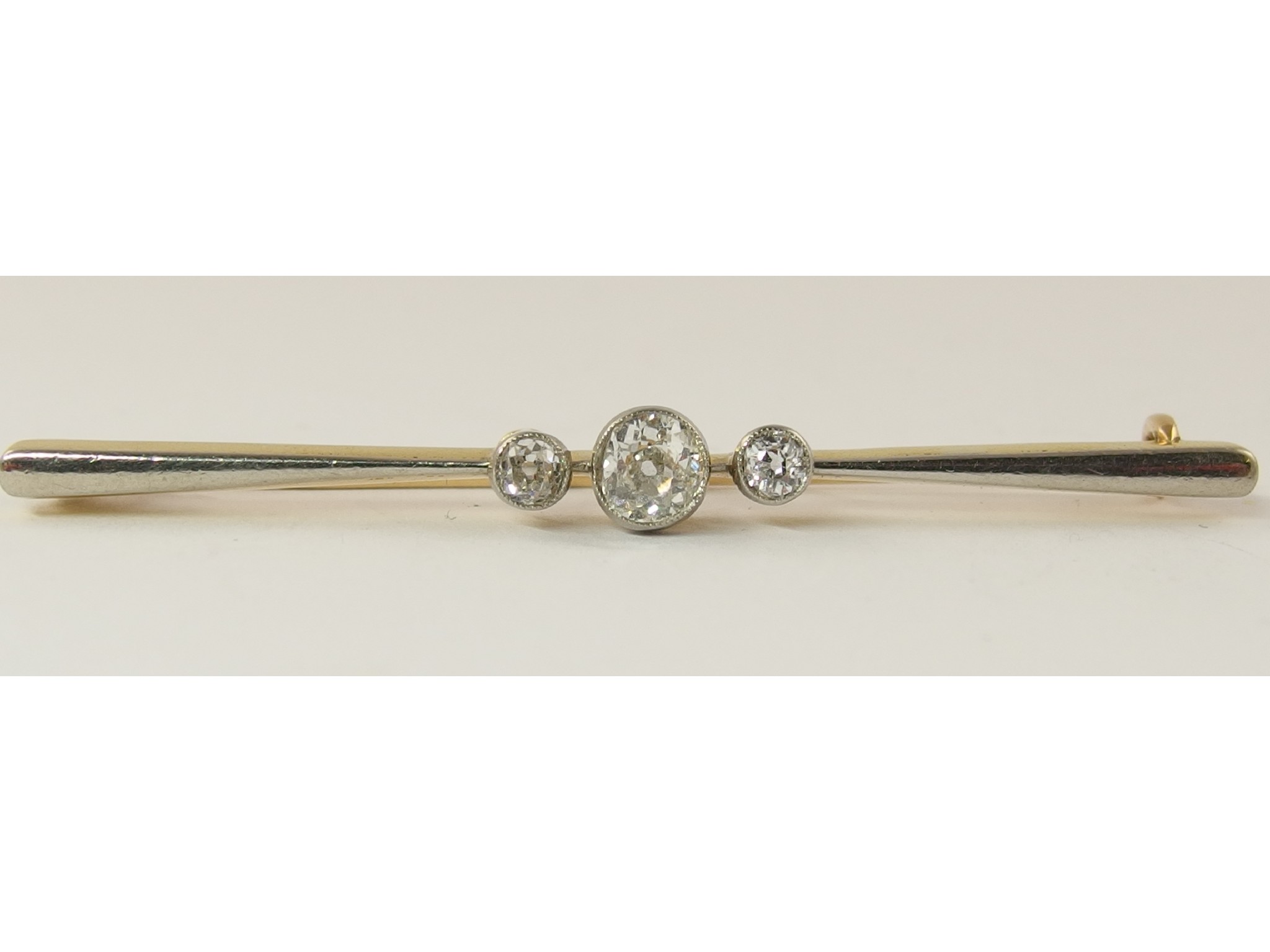 Appraisal: An old cut three stone diamond bar brooch the diamonds