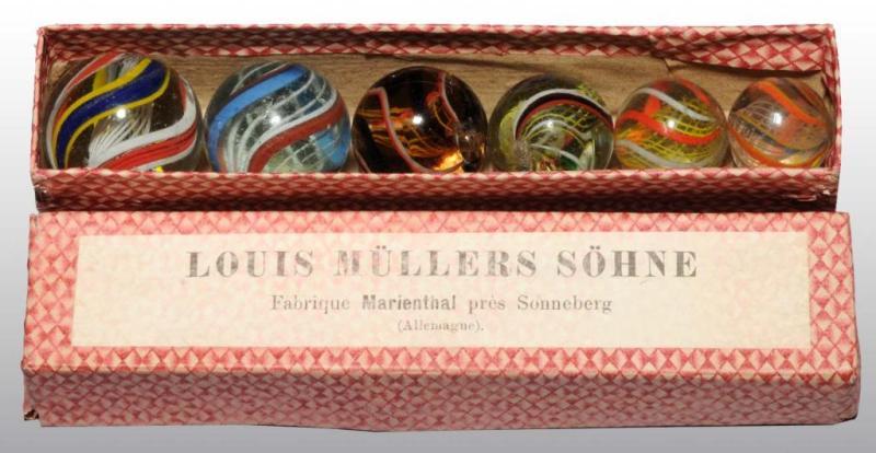 Appraisal: Graduated Coffin Box with German Swirl Marbles Description Possibly a