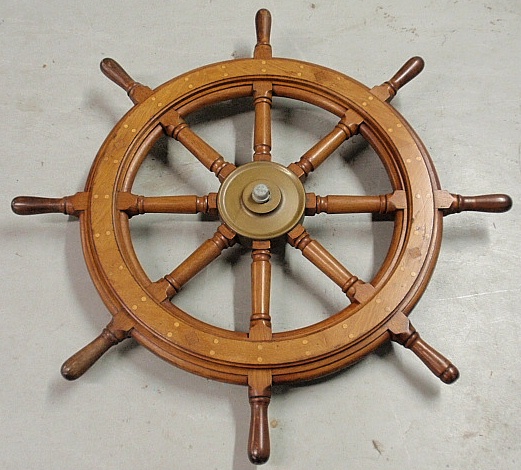 Appraisal: - Inlaid mahogany and brass sailing ship s wheel marked