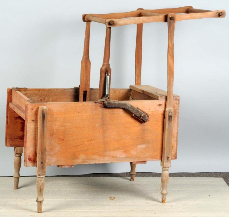 Appraisal: Early Wooden Trestle Washing Machine Description Circa late s Comes