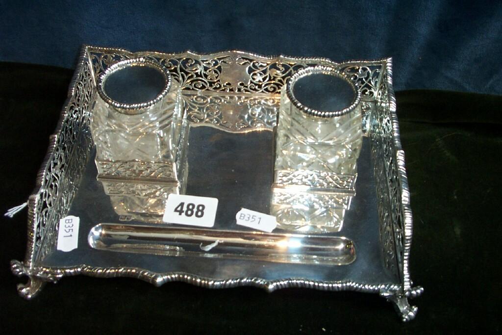 Appraisal: A silver inkstand of rectangular form with raised and pierced