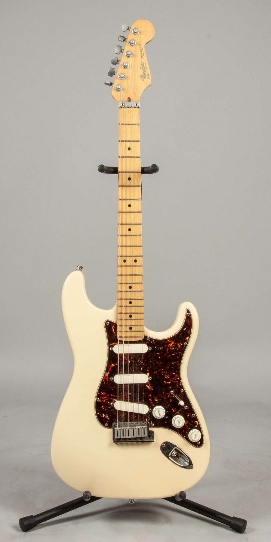 Appraisal: Fender Stratocaster Plus E Cream body with tortoise shell pickguard