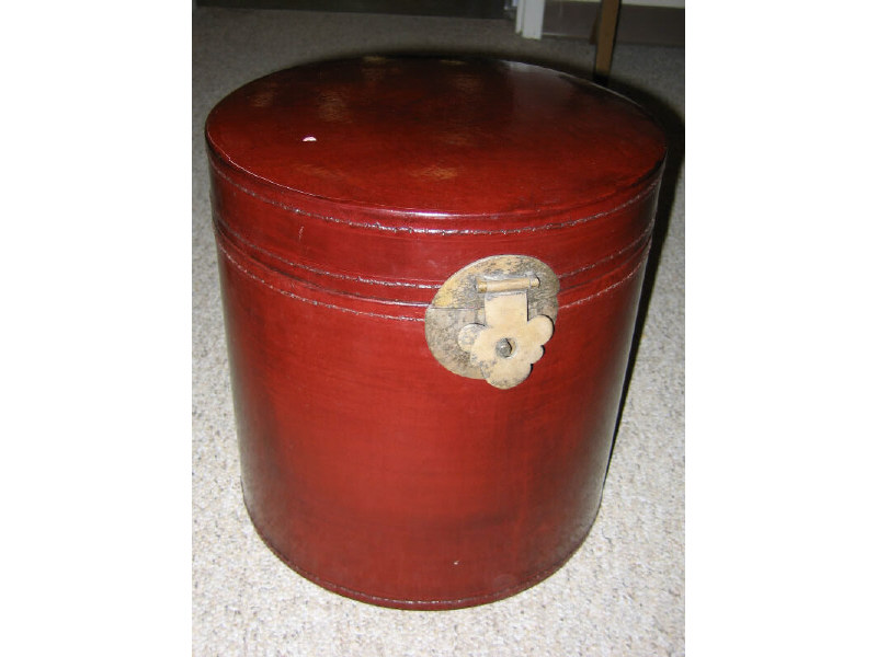 Appraisal: CHINESE RED LACQUER BOX of cylindrical form with brass hinge