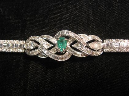 Appraisal: Platinum emerald and diamond bracelet Set with a pear shaped