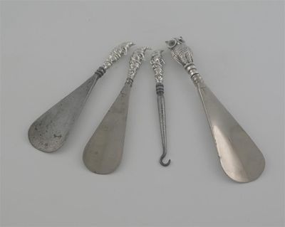 Appraisal: Four Edwardian novelty mounted steel implements two small shoe horns