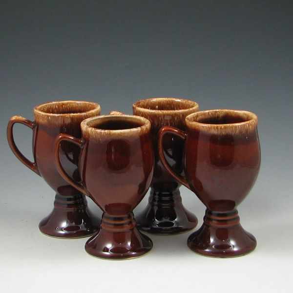 Appraisal: Four Hull Mirror Brown Continental Mugs marked Hull USA ''h