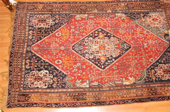 Appraisal: SHIRAZ old Red central field with blue corner motifs and