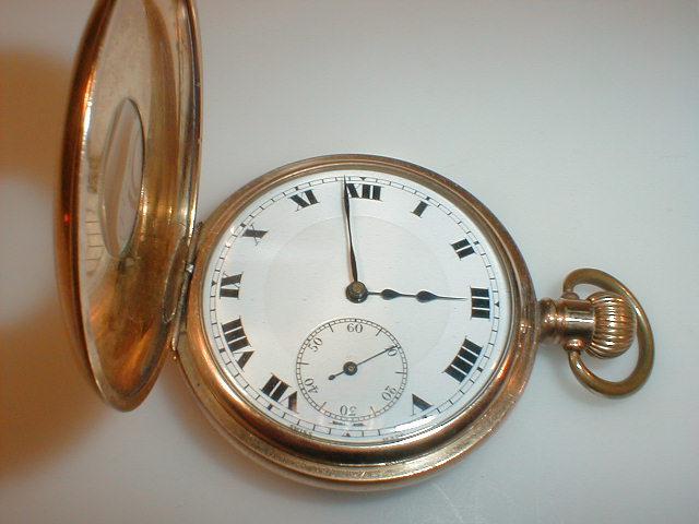 Appraisal: A gold plated half hunter pocket watch movement marked BUREN