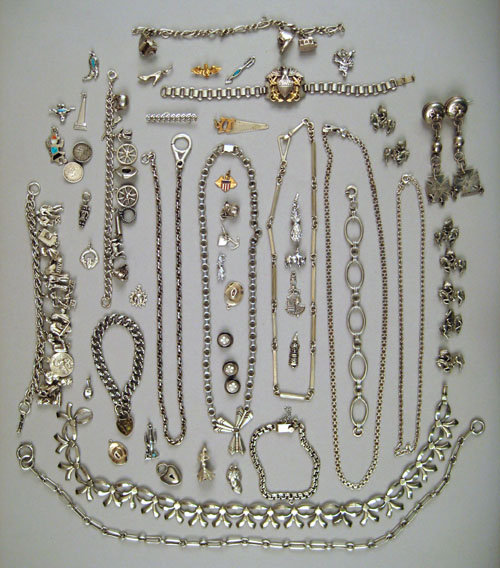 Appraisal: Sterling silver and other jewelry to include charm bracelets charms