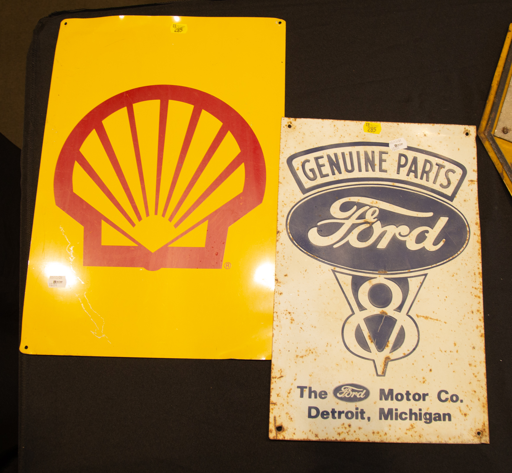 Appraisal: TWO AUTOMOTIVE TIN SIGNS Includes Shell Oil sign in H