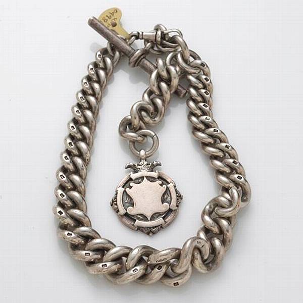 Appraisal: A silver watch chain and fob English with English hallmarks