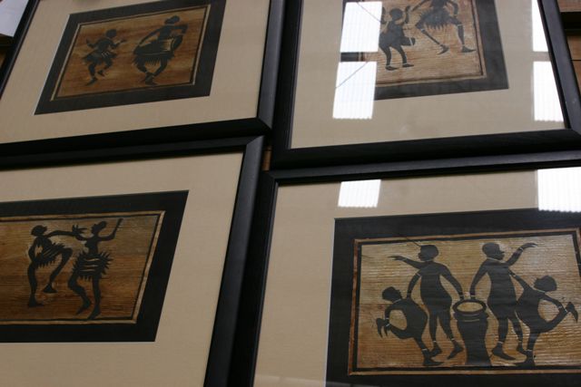 Appraisal: Four framed African bark pictures mounted on cloth