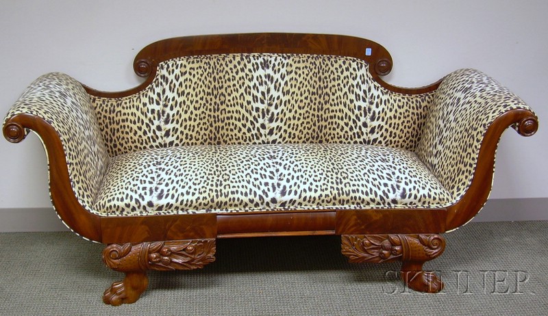 Appraisal: Empire Leopard Print Upholstered Carved Mahogany and Mahogany Veneer Settee