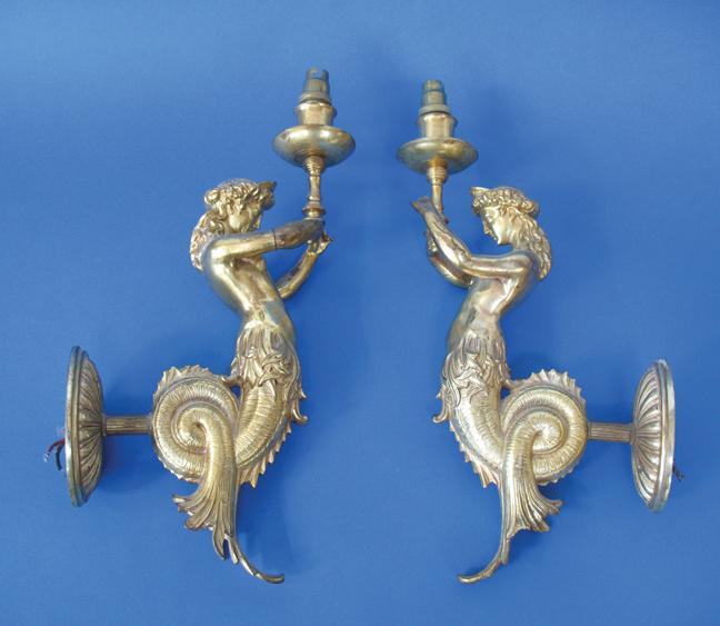 Appraisal: A PAIR OF GILT METAL WALL SCONCES each with a