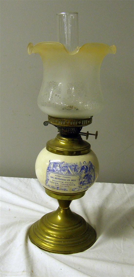 Appraisal: th Century oil lamp with porcelain and brass body retail