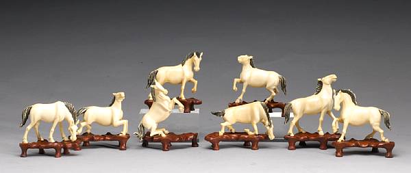 Appraisal: A group of eight ivory horses th Century Inspired by