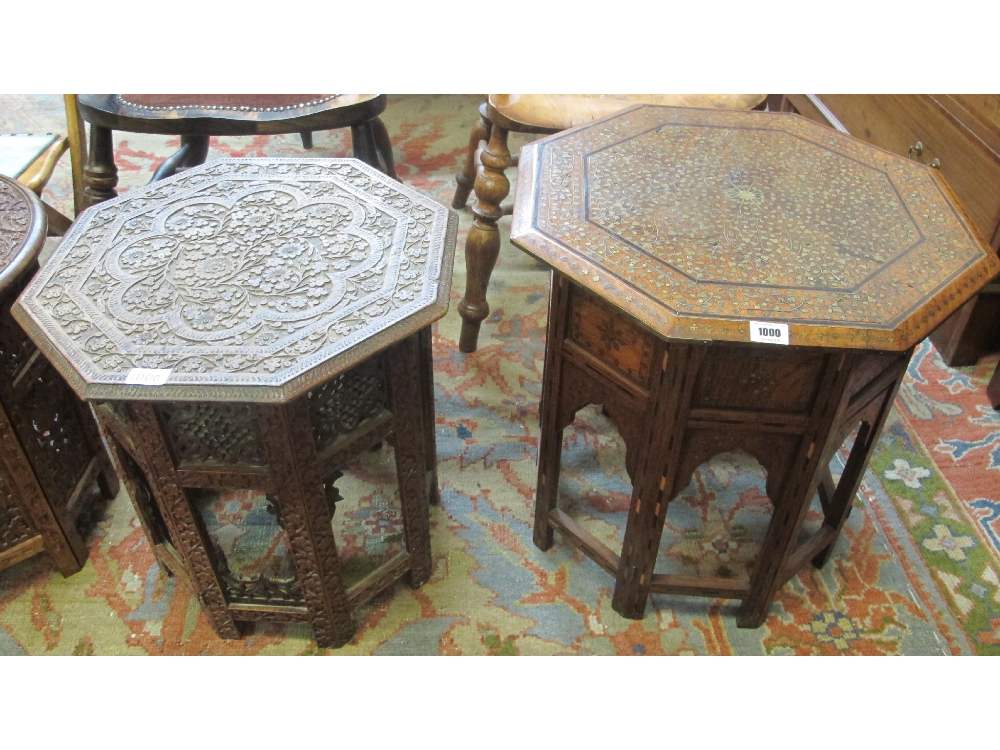 Appraisal: A pair of Eastern octagonal tables one with brass top