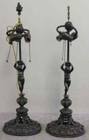 Appraisal: Pair of Bronze Caldwell Lamps Figural nudes atop Bacchus head