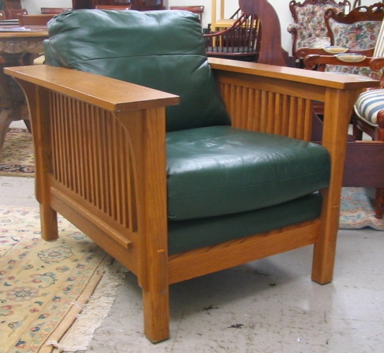 Appraisal: ARTS CRAFTS STYLE OAK AND GREEN LEATHER ARMCHAIRS American recent