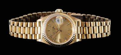 Appraisal: Lady's gold Rolex wristwatch oyster perpetual datejust movement gold satin