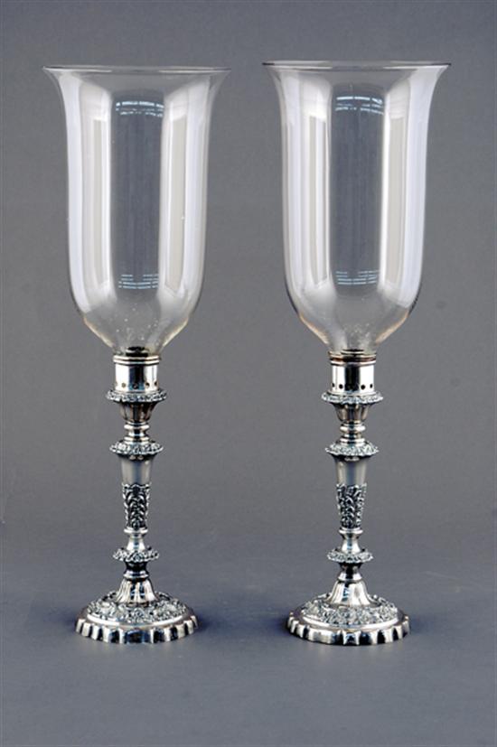 Appraisal: Pair Sheffield silverplate candlesticks with hurricane shades mid th centurybaluster